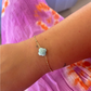 Armband mit türkisfarbenem Kleeblatt