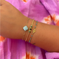 Armband mit türkisfarbenem Kleeblatt